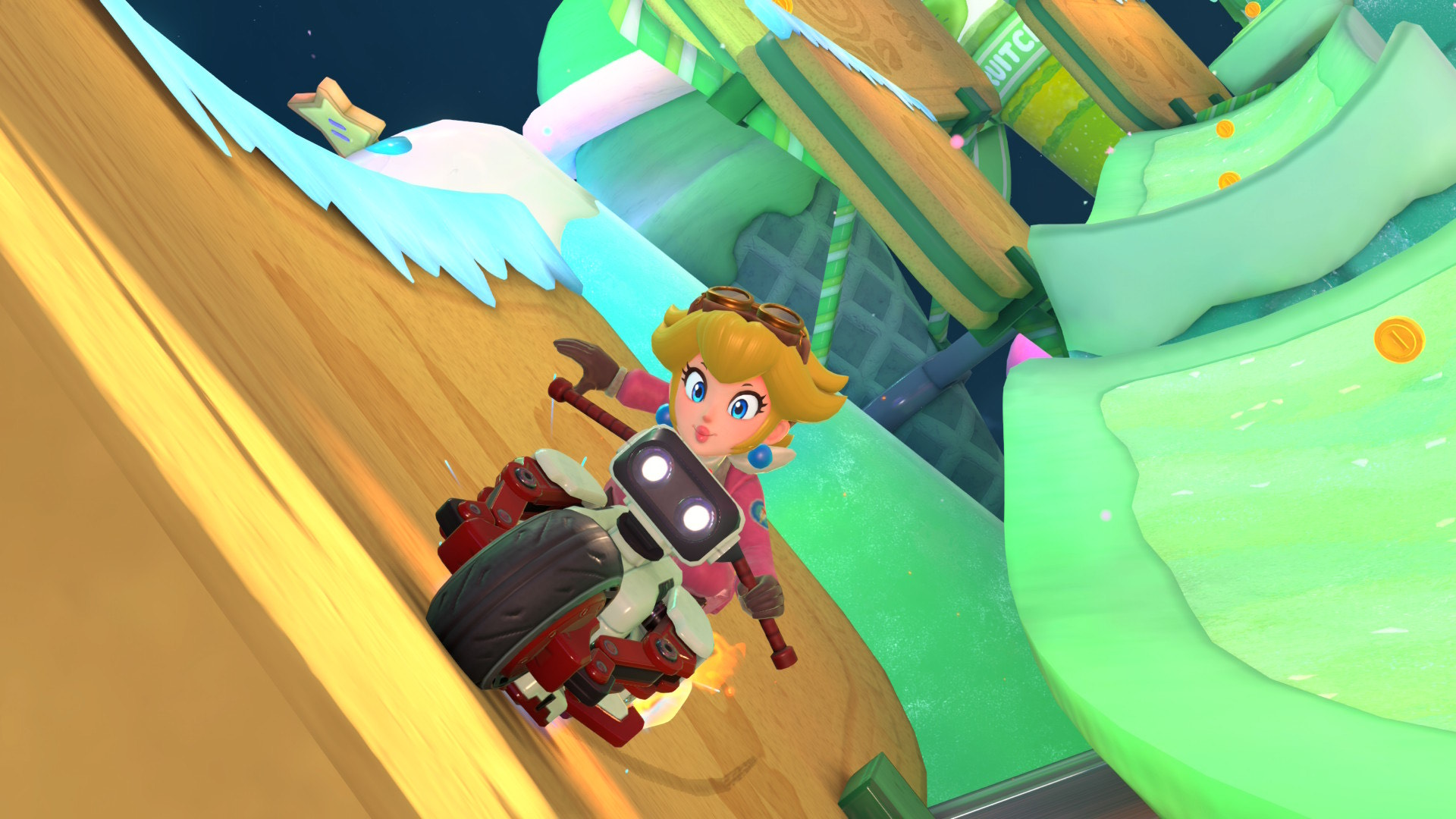Wall riding and rail riding are new gameplay features in Mario Kart World, one of them demonstrated here by Peach on Sky-High Sundae.