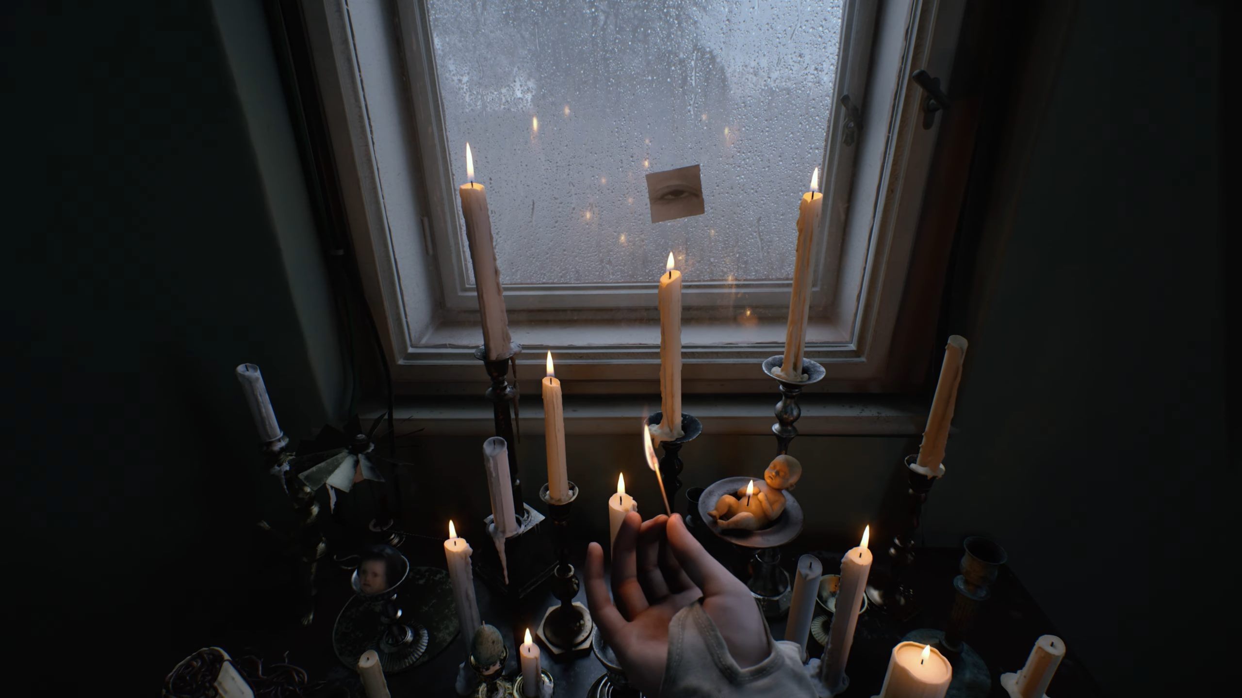 Sophia Lillis' character in OD - KNOCK slowly attempts to light all the candles as she hears knocking from the door behind, getting louder and louder.