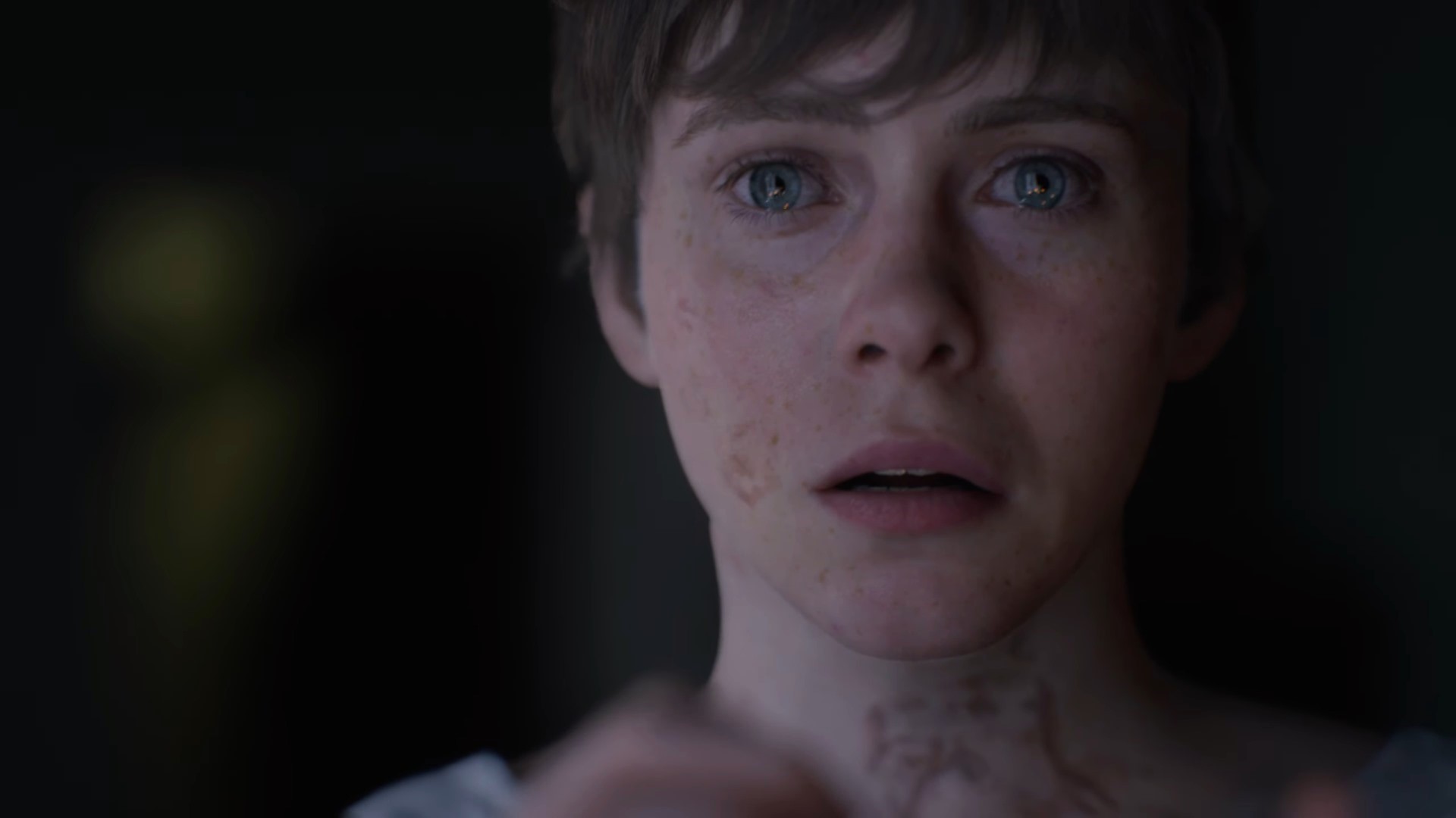 Sophia Lillis' character in OD - KNOCK looks on in fear, as she hears footsteps from behind her. The knocking has stopped, but the evil is now inside.