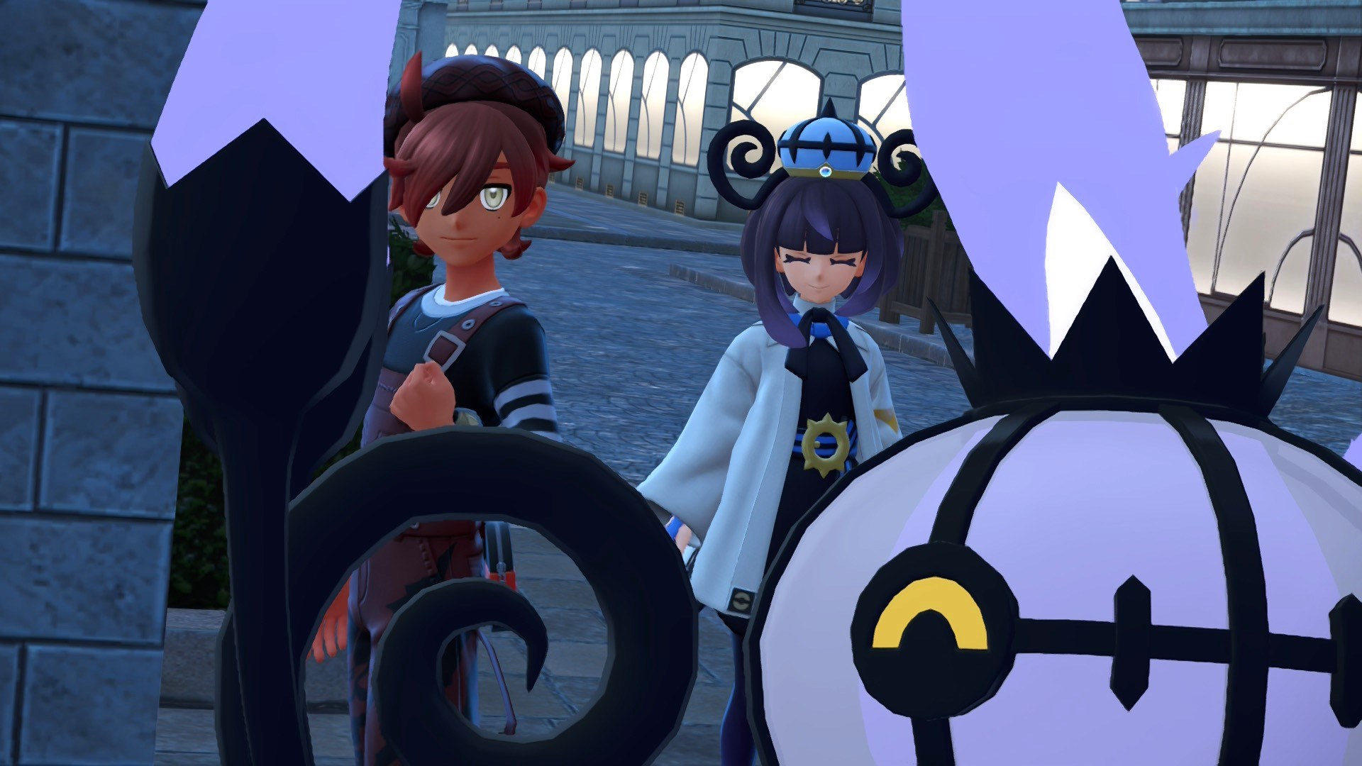 Player character posed next to Chandelure and Gwynn, using the in-game photo mode.